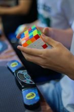 person holding 3 x 3 rubiks cube